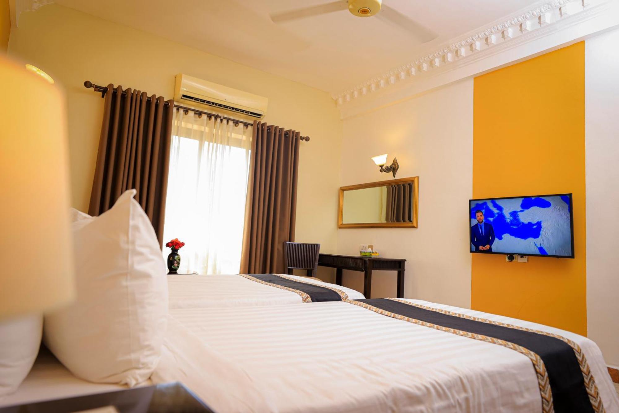 Colosseum Boutique Hotel & Spa Дар ес Саалам Екстериор снимка