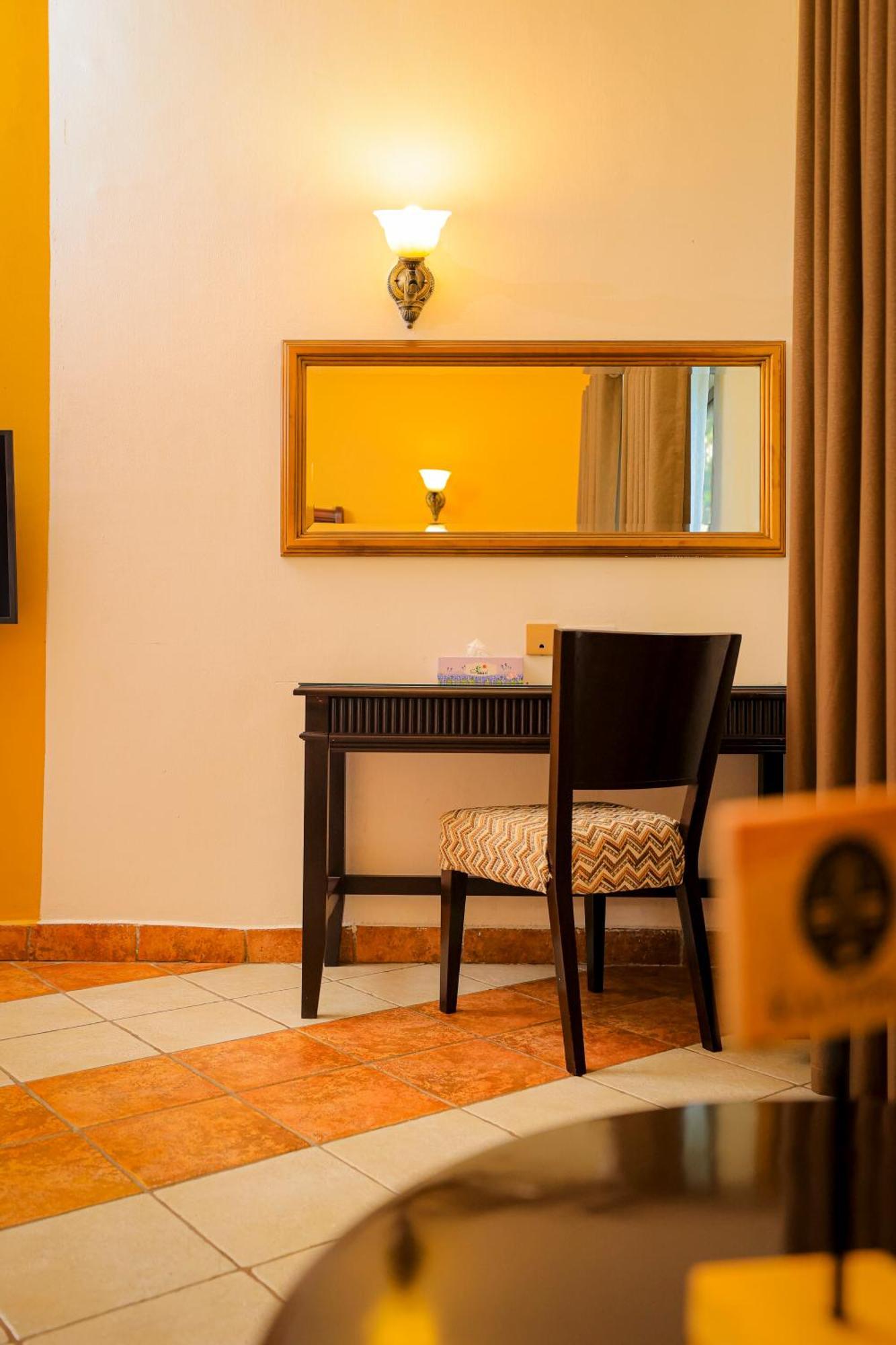 Colosseum Boutique Hotel & Spa Дар ес Саалам Стая снимка