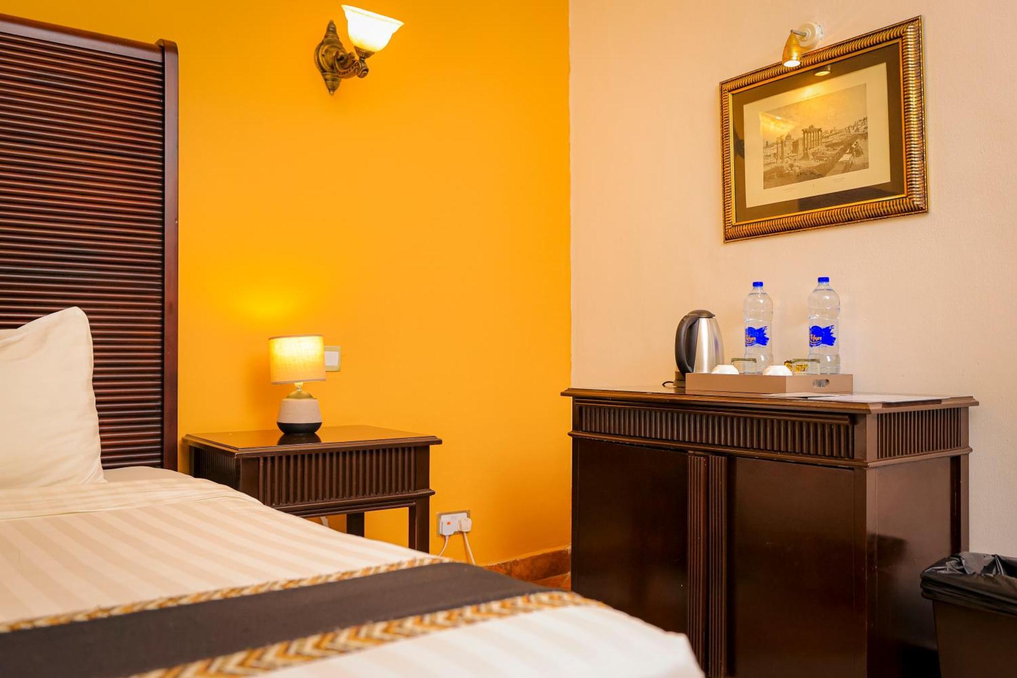 Colosseum Boutique Hotel & Spa Дар ес Саалам Стая снимка