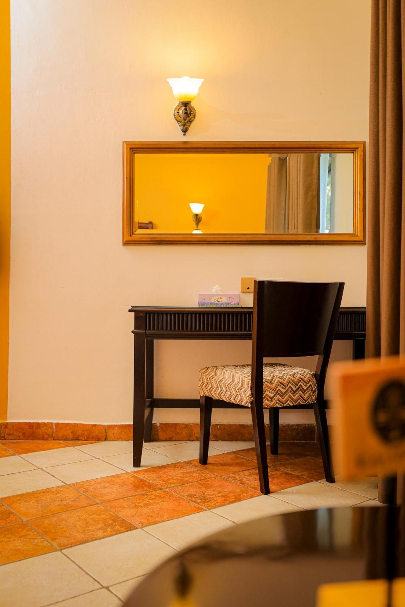 Colosseum Boutique Hotel & Spa Дар ес Саалам Стая снимка