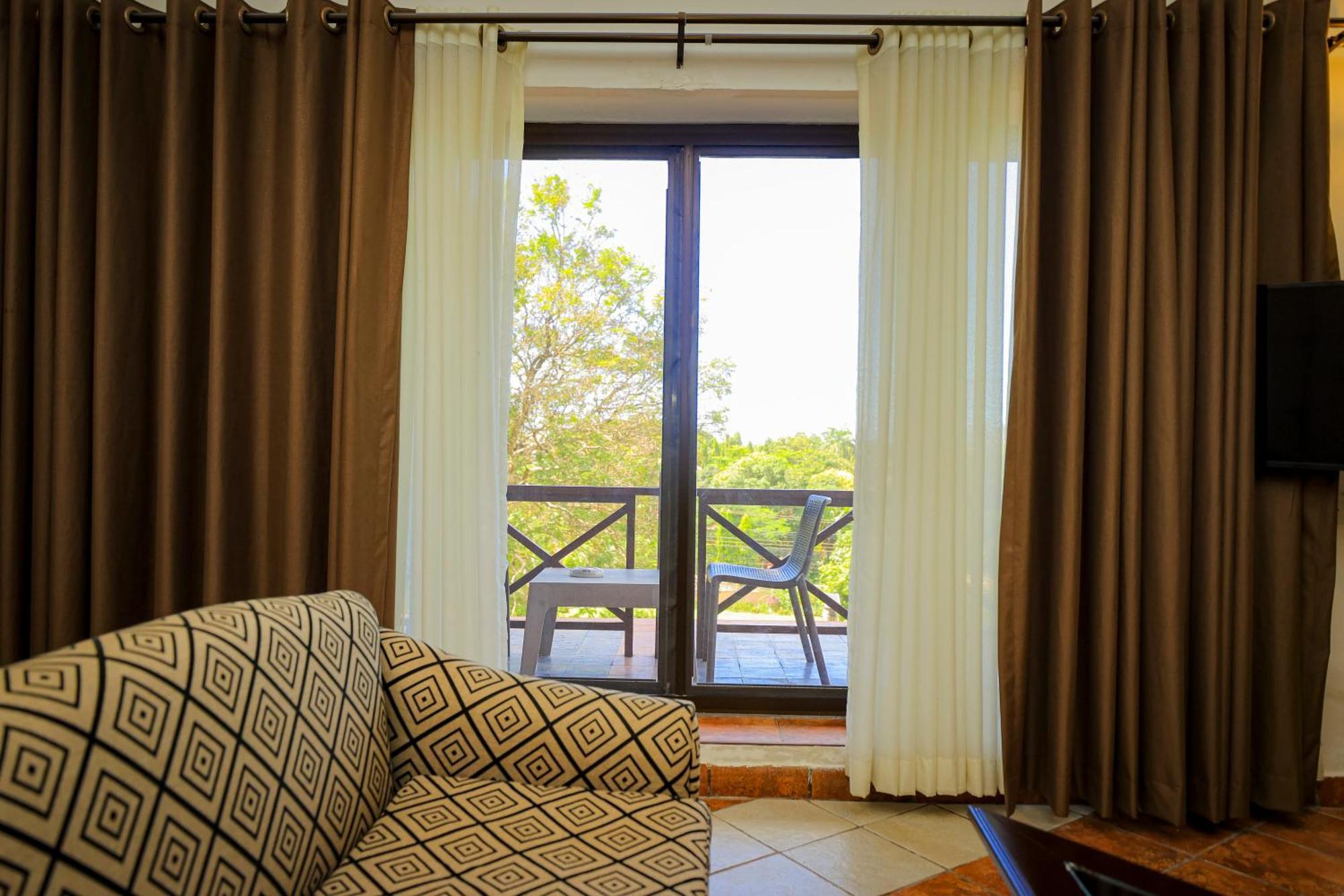 Colosseum Boutique Hotel & Spa Дар ес Саалам Стая снимка